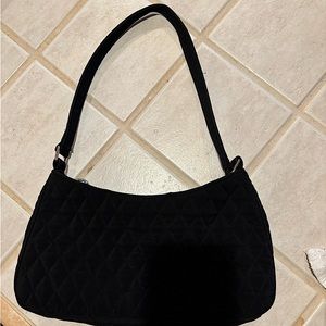 black  11 inches wide  5 1/2 inches deep strap is 11 inches pocket inside